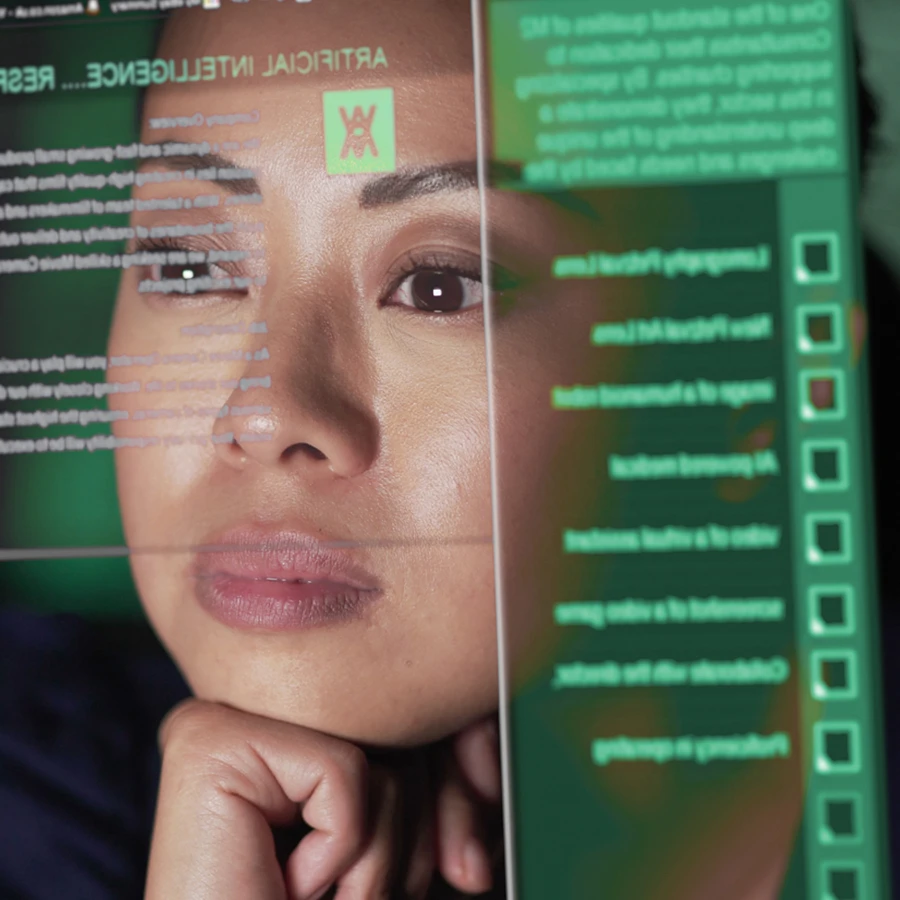 Image of a developer analysing data on a screen